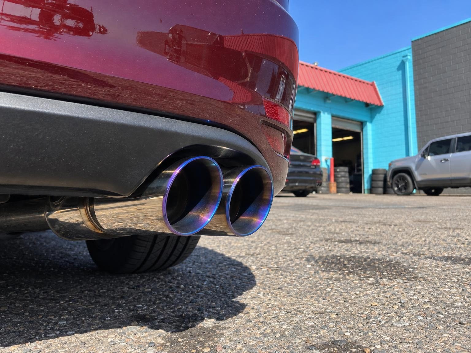 Dual exhaust tips with a blue heat tint