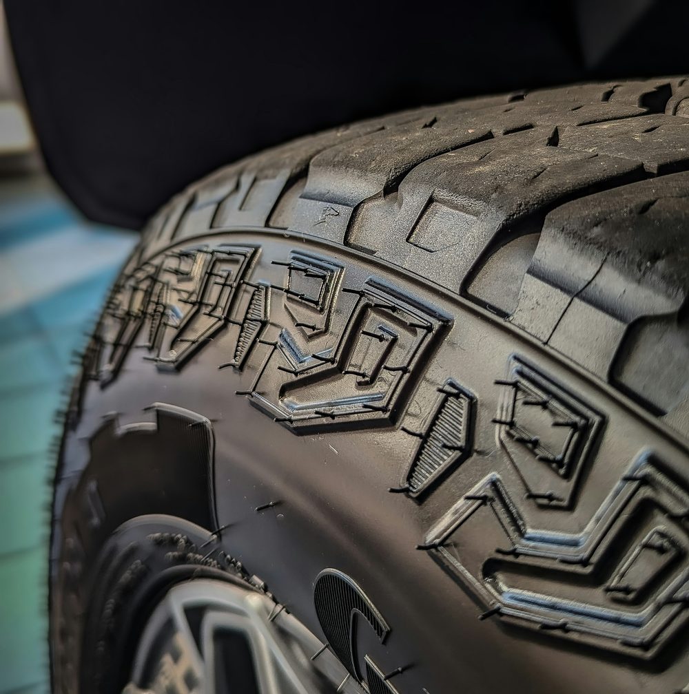 Close-up of a fresh all-terrain tire tread